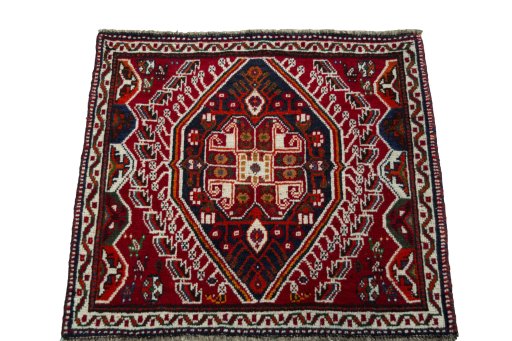 Surface texture of 2000s Shiraz rug with natural Wool and intricate pattern