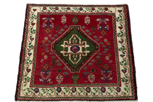 Surface texture of 2000s Shiraz rug with natural Wool and intricate pattern