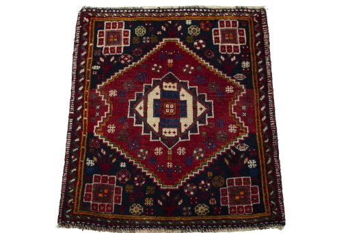 Surface texture of 2000s Shiraz rug with natural Wool and intricate pattern