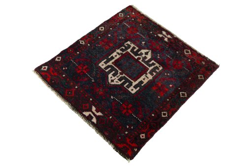 Corner detail of 2000s Shiraz rug showing border pattern and Wool pile