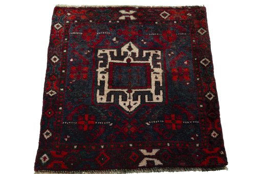 Surface texture of 2000s Shiraz rug with natural Wool and intricate pattern
