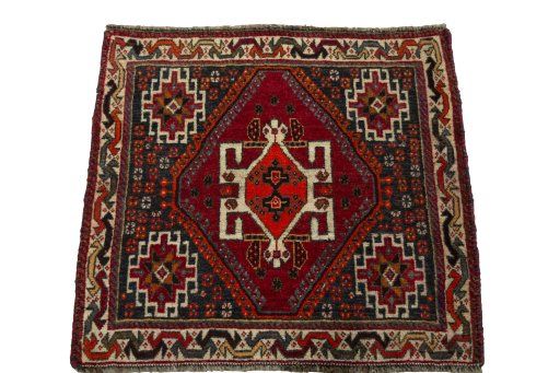 Surface texture of 2000s Shiraz rug with natural Wool and intricate pattern