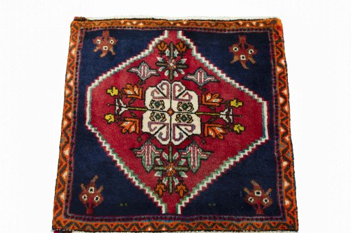 Surface texture of 2000s Shiraz rug with natural Wool and intricate pattern