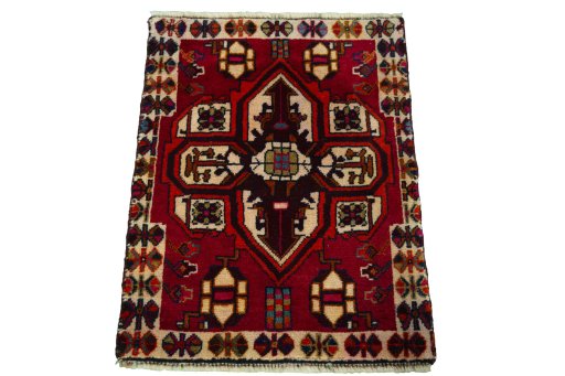 Surface texture of 2000s Shiraz rug with natural Wool and intricate pattern
