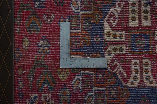 Backside of handmade 2000s Shiraz rug showing knot structure and weave density