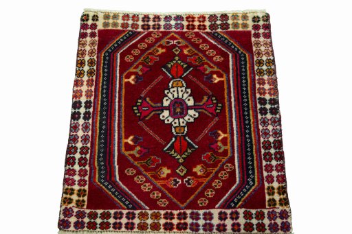 Surface texture of 2000s Shiraz rug with natural Wool and intricate pattern