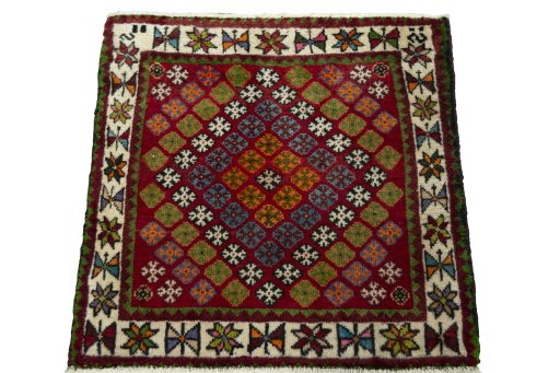 Surface texture of 2000s Shiraz rug with natural Wool and intricate pattern