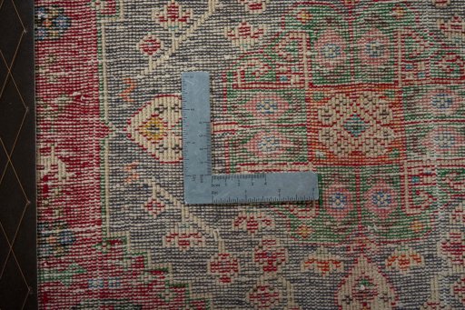 Backside of handmade 2000s Shiraz rug showing knot structure and weave density