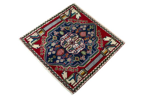 Corner detail of 2000s Shiraz rug showing border pattern and Wool pile