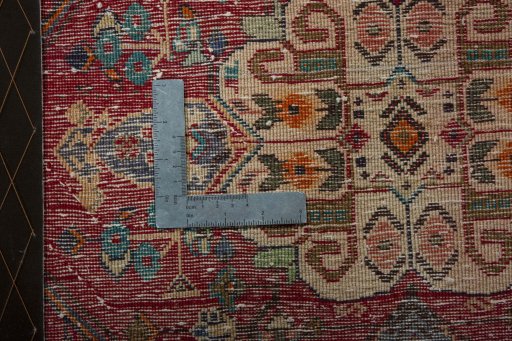 Backside of handmade 2000s Shiraz rug showing knot structure and weave density