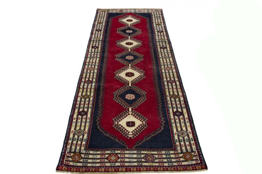 Surface texture of 2000s Shiraz rug with natural Wool and intricate pattern