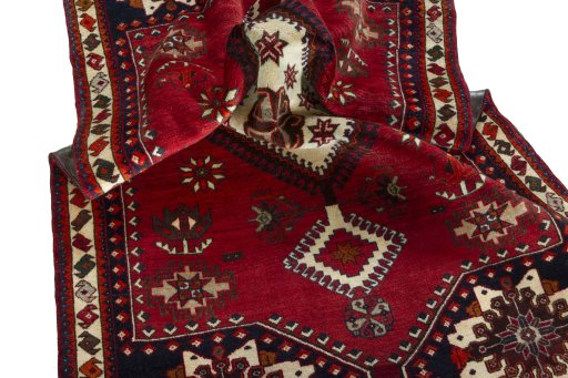 Close-up detail of 2000s Shiraz rug from Iran / Persia showing Wool weave
