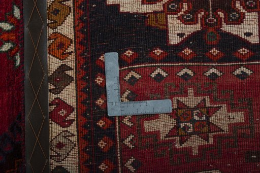 Surface texture of 2000s Shiraz rug with natural Wool and intricate pattern