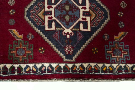 Central medallion detail of 2000s Shiraz rug from Iran / Persia