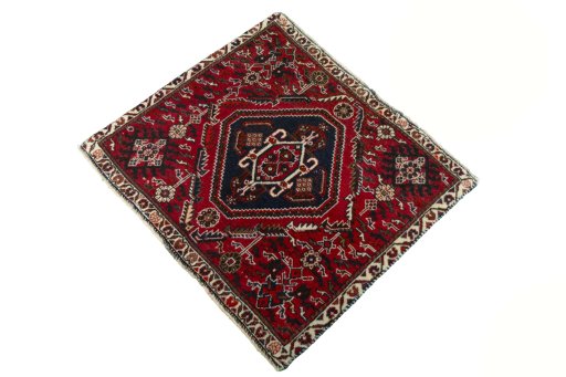 Corner detail of 2000s Shiraz rug showing border pattern and Wool pile