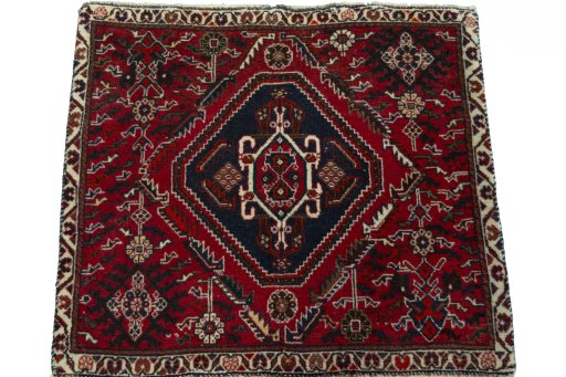 Surface texture of 2000s Shiraz rug with natural Wool and intricate pattern