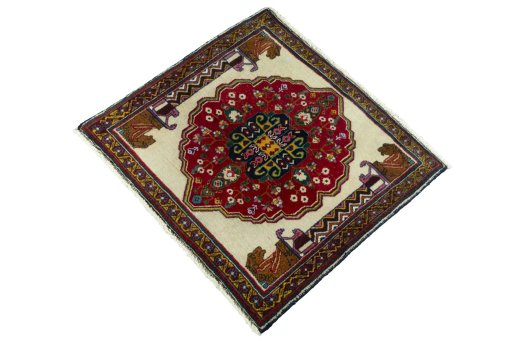 Corner detail of 2000s Shiraz rug showing border pattern and Wool pile