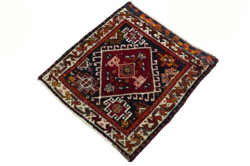 Corner detail of 2000s Shiraz rug showing border pattern and Wool pile