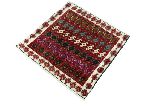 Corner detail of 2000s Shiraz rug showing border pattern and Wool pile