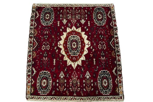 Surface texture of 2000s Shiraz rug with natural Wool and intricate pattern