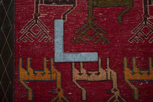 Backside of handmade 2000s Shiraz rug showing knot structure and weave density
