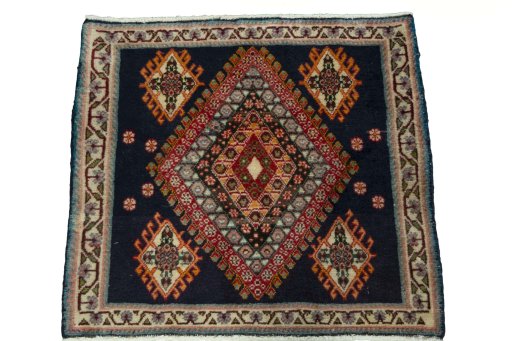 Surface texture of 2000s Shiraz rug with natural Wool and intricate pattern