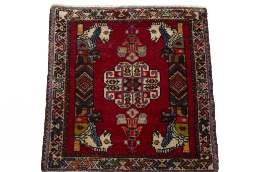 Surface texture of 2000s Shiraz rug with natural Wool and intricate pattern