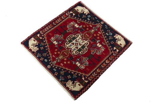 Corner detail of 2000s Shiraz rug showing border pattern and Wool pile