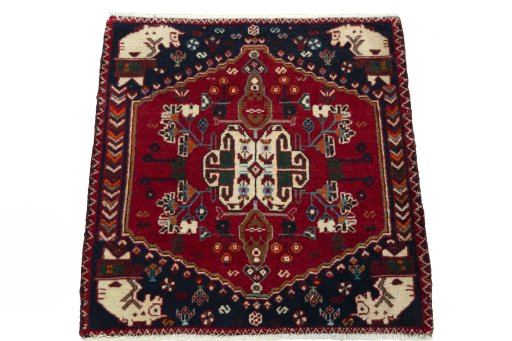 Surface texture of 2000s Shiraz rug with natural Wool and intricate pattern
