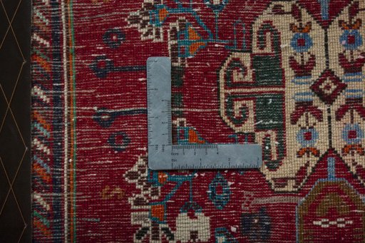 Backside of handmade 2000s Shiraz rug showing knot structure and weave density