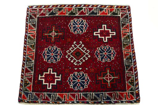 Surface texture of 2000s Shiraz rug with natural Wool and intricate pattern