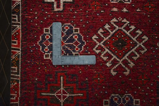 Backside of handmade 2000s Shiraz rug showing knot structure and weave density