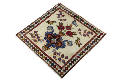 Corner detail of 2000s Shiraz rug showing border pattern and Wool pile