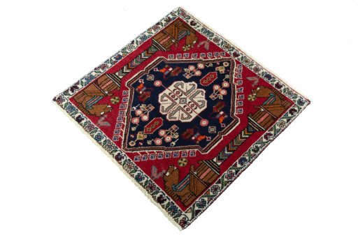 Corner detail of 2000s Shiraz rug showing border pattern and Wool pile