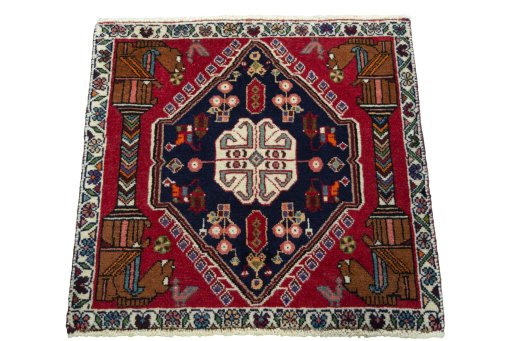 Surface texture of 2000s Shiraz rug with natural Wool and intricate pattern