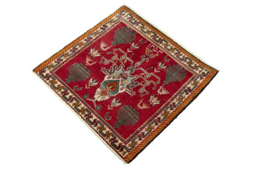 Corner detail of 2000s Shiraz rug showing border pattern and Wool pile