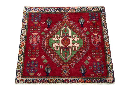 Surface texture of 2000s Shiraz rug with natural Wool and intricate pattern