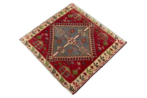 Corner detail of 2000s Shiraz rug showing border pattern and Wool pile