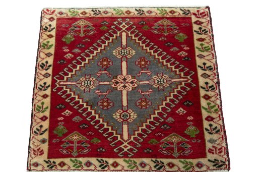 Surface texture of 2000s Shiraz rug with natural Wool and intricate pattern