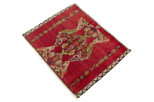 Corner detail of 2000s Shiraz rug showing border pattern and Wool pile
