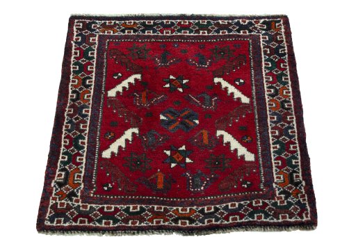 Surface texture of 2000s Shiraz rug with natural Wool and intricate pattern