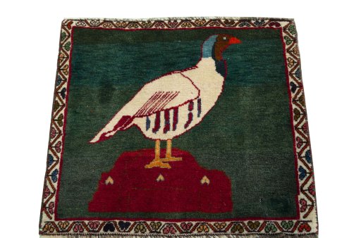 Surface texture of 2000s Shiraz rug with natural Wool and intricate pattern