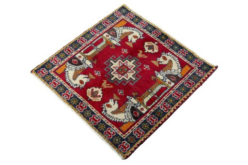 Corner detail of 2000s Shiraz rug showing border pattern and Wool pile