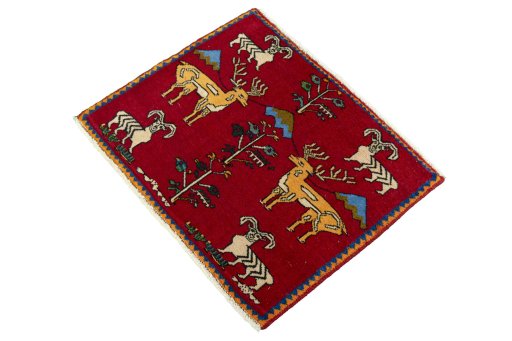 Corner detail of 2000s Shiraz rug showing border pattern and Wool pile