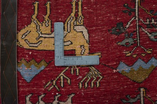 Backside of handmade 2000s Shiraz rug showing knot structure and weave density