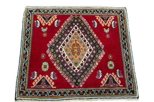 Surface texture of 2000s Shiraz rug with natural Wool and intricate pattern