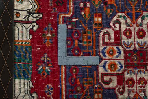 Backside of handmade 2000s Shiraz rug showing knot structure and weave density