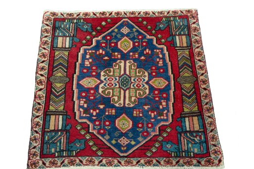 Surface texture of 2000s Shiraz rug with natural Wool and intricate pattern