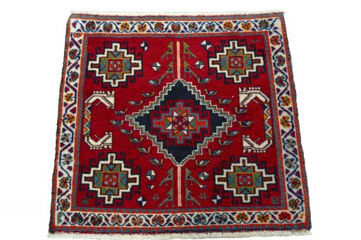 Surface texture of 2000s Shiraz rug with natural Wool and intricate pattern