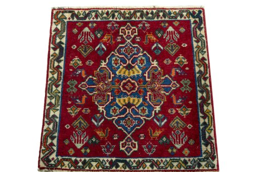 Surface texture of 2000s Shiraz rug with natural Wool and intricate pattern
